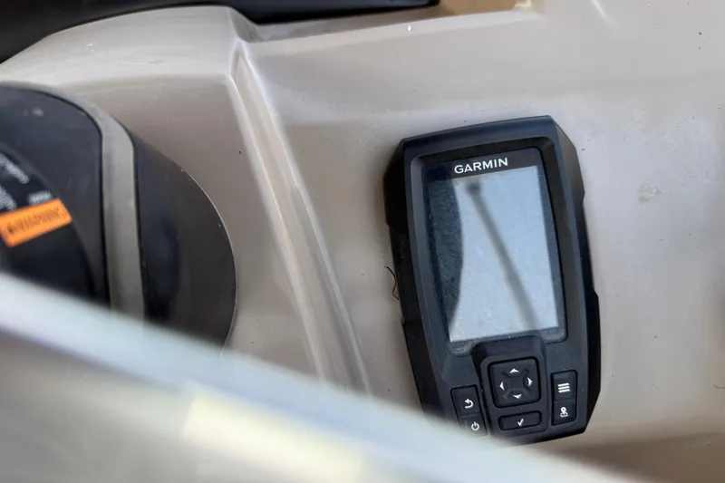 Slide: The Image of 2020 Bennington 21SF boat dashboard with Kicker media center and USB port. - 63