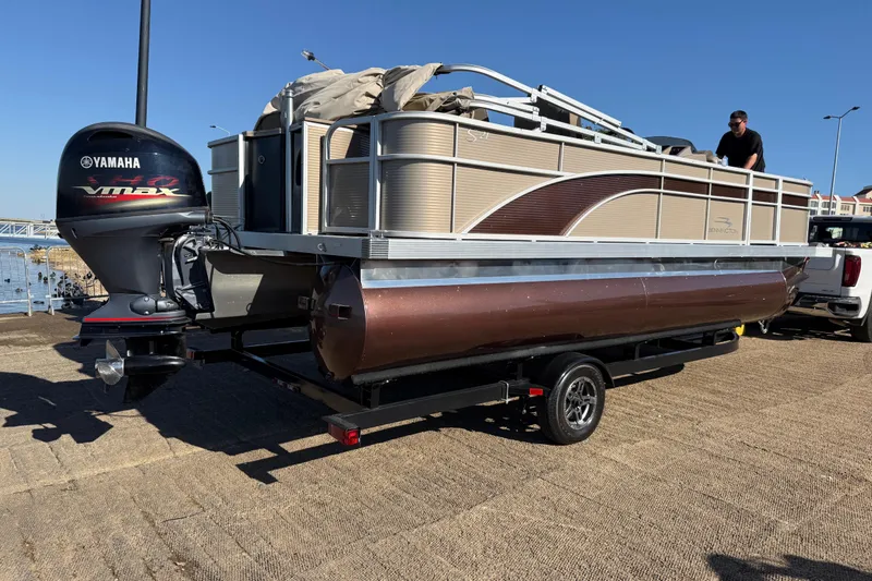 Slide: The Image of 2020 Bennington 21SF pontoon boat on trailer with Yamaha VMAX outboard motor. - 77