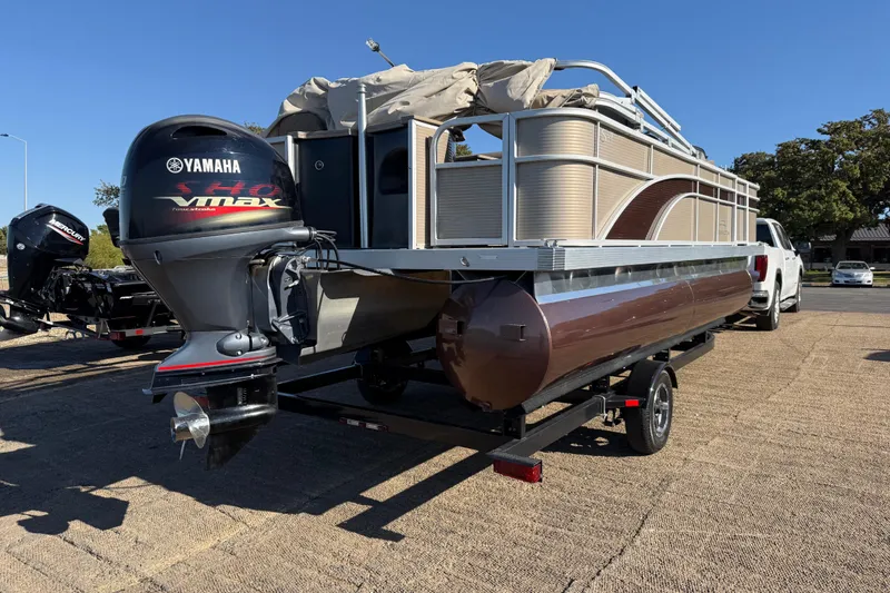 Slide: The Image of 2020 Bennington 21SF pontoon boat on trailer with Yamaha VMAX outboard motor. - 78