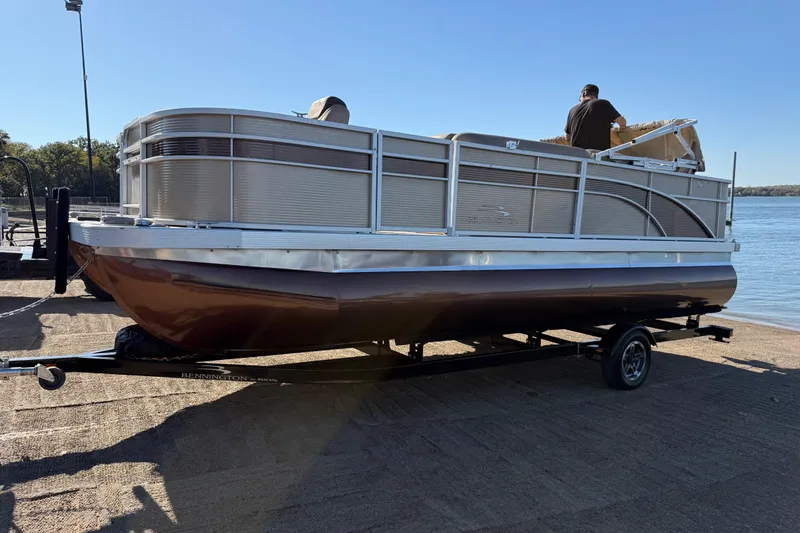Slide: The Image of 2020 Bennington 21SF pontoon boat on trailer with Yamaha VMAX outboard motor. - 83