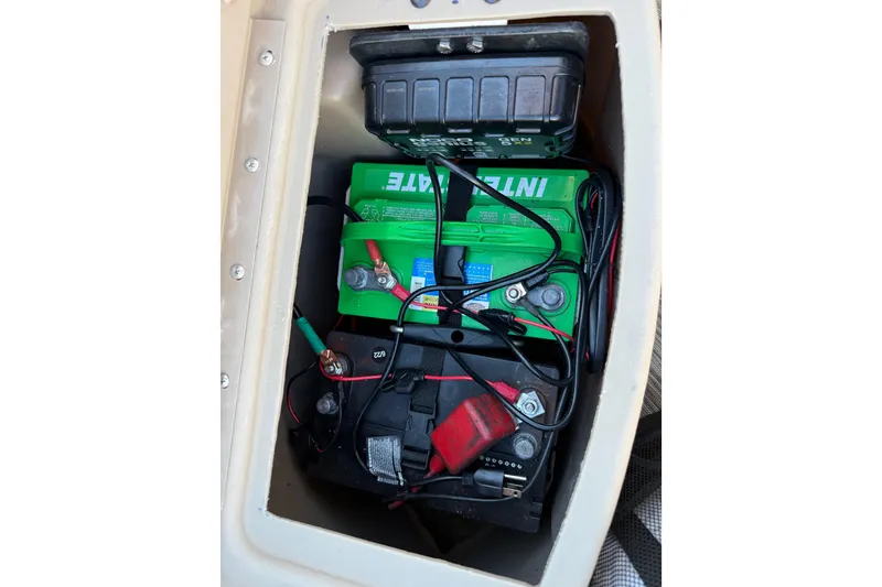 Slide: The Image of 2020 Bennington 21SF pontoon boat interior with beige seating and steering console. - 91