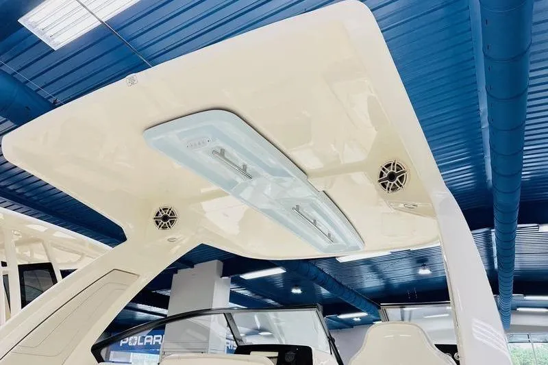 Slide: The Image of 2026 Scout 277 Dorado boat interior with modern roof design and integrated lighting. - 16