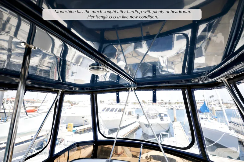 Slide: The Image of Interior view of 1993 Mediterranean 38 Convertible yacht with reflective hardtop and clear isinglass. - 18
