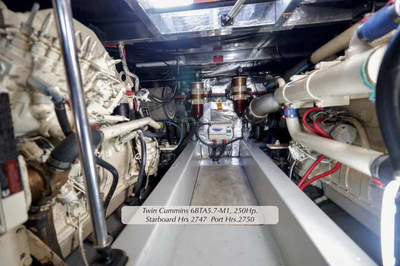 Slide: The Image of Engine room of 1993 Mediterranean 38 Convertible with twin Cummins 6BTA5.7-M1 engines, 250Hp. - 25