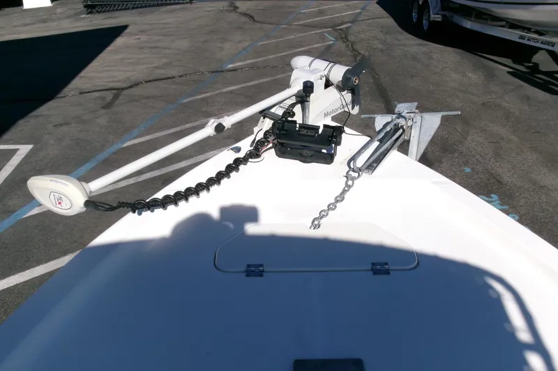 Slide: The Image of 2001 Sea Fox 215 Bay Fisher boat with trolling motor and anchor on deck. - 4