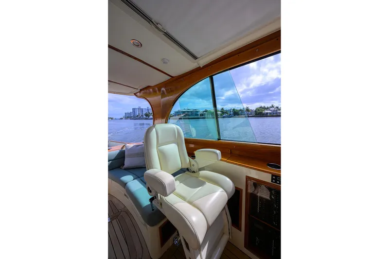 Slide: The Image of Interior of 2017 Hinckley Picnic Boat 37 MKIII with luxurious seating and scenic water view. - 23