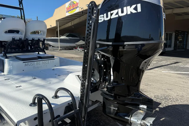 Slide: The Image of 2024 SCB R24 boat on trailer, side view with registration number TX 6633 RE. - 10