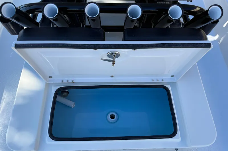 Slide: The Image of 2024 SCB R24 boat livewell with open lid, showing interior details. - 20
