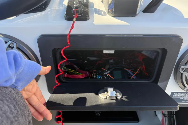 Slide: The Image of 2024 SCB R24 boat interior with dual seats and rod holders, Rockport, TX. - 24