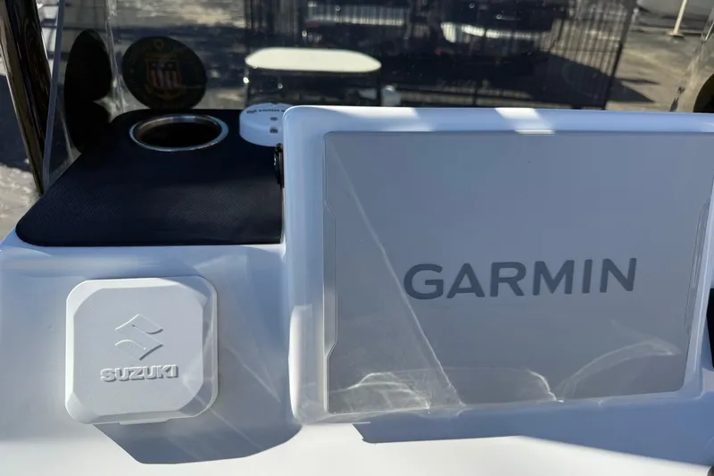 Slide: The Image of 2024 SCB R24 boat interior with seating and storage compartments. - 27