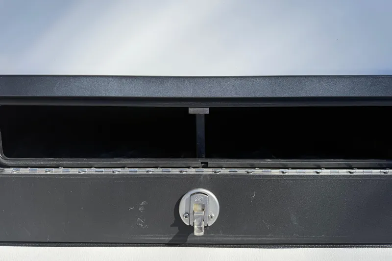 Slide: The Image of 2024 SCB R24 boat control panel with ignition switch and throttle lever. - 36