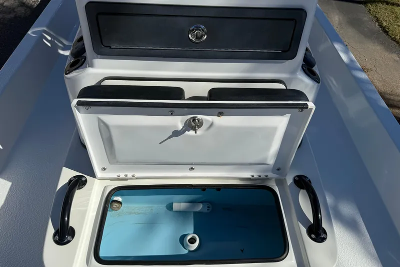 Slide: The Image of 2024 SCB R24 boat dashboard with Garmin and Minn Kota equipment. - 37