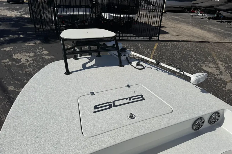 Slide: The Image of 2024 SCB R24 boat seats with logo, featuring sleek white and black design. - 39