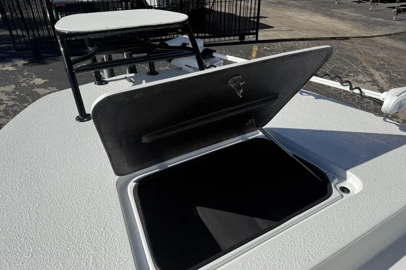 Slide: The Image of 2024 SCB R24 boat interior with rod holders and seating. - 40