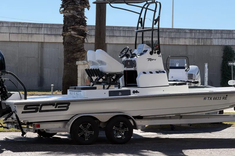 Slide: The Image of 2024 SCB R24 boat deck with trolling motor and storage hatch. - 45