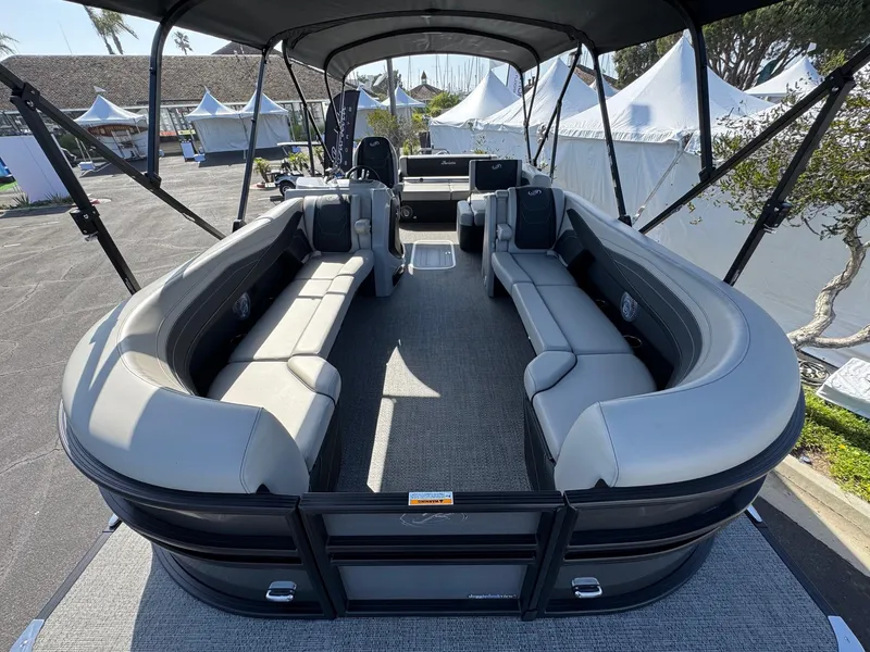 Slide: The Image of 2026 Barletta Cabrio 24U pontoon boat with spacious seating and canopy. - 10