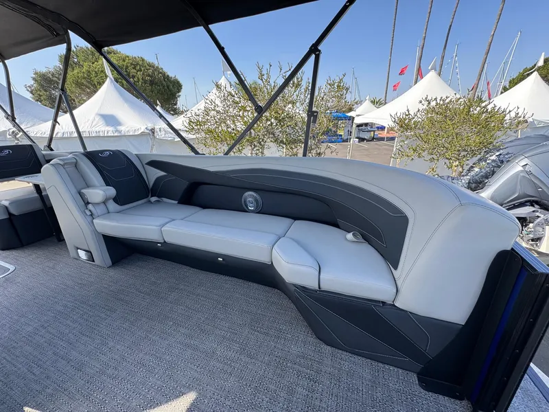 Slide: The Image of Luxurious seating on the 2026 Barletta Cabrio 24U pontoon boat, showcasing modern design. - 12