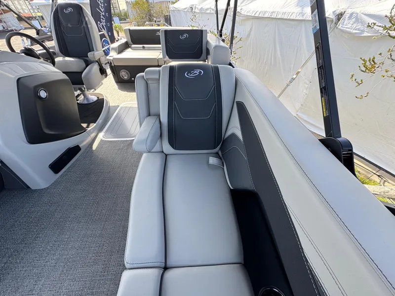 Slide: The Image of 2026 Barletta Cabrio 24U boat interior with luxurious seating and modern design. - 14