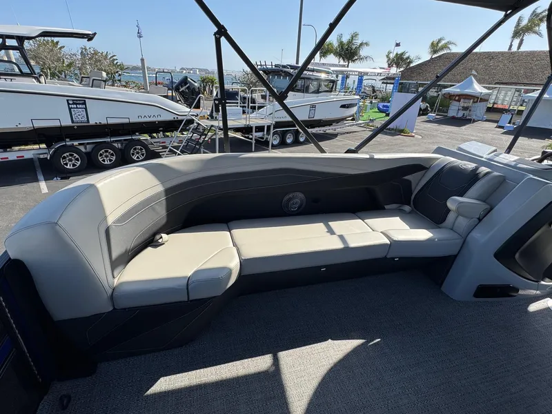 Slide: The Image of 2026 Barletta Cabrio 24U boat interior with luxurious seating and modern design. - 18
