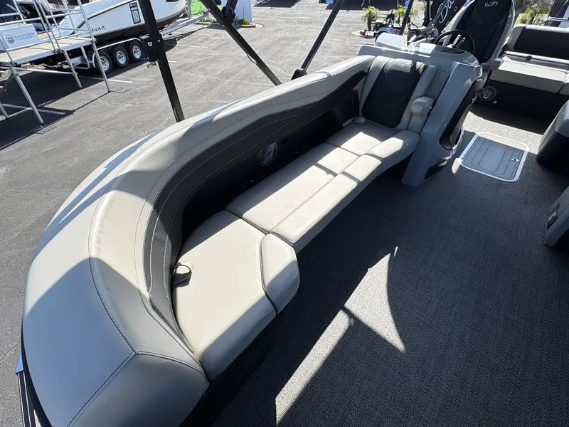 Slide: The Image of 2026 Barletta Cabrio 24U pontoon boat interior with plush seating and modern design. - 19