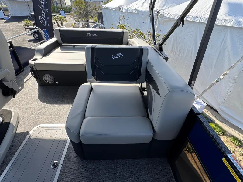 Slide: The Image of 2026 Barletta Cabrio 24U boat interior with luxurious seating and modern design. - 26