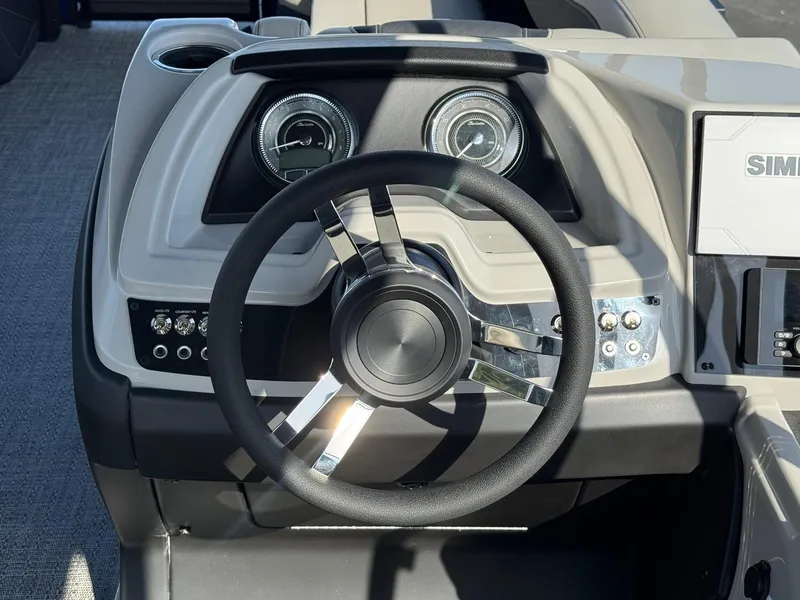 Slide: The Image of Steering wheel and dashboard of 2026 Barletta Cabrio 24U boat. - 29