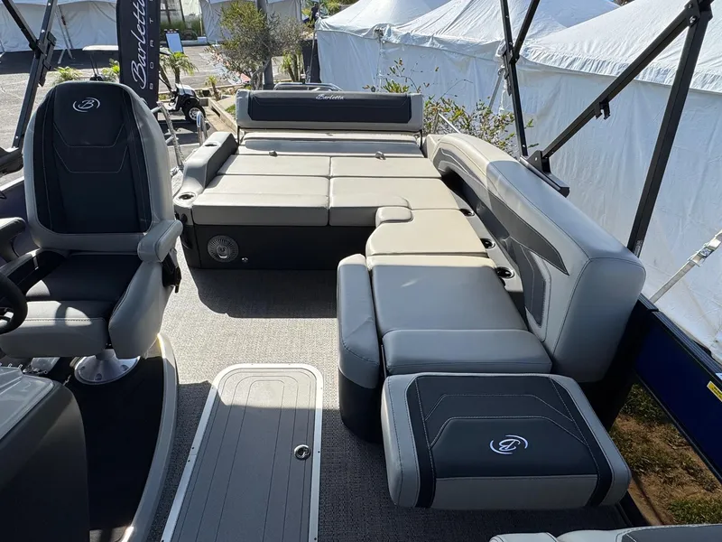 Slide: The Image of 2026 Barletta Cabrio 24U pontoon boat interior with luxurious seating and modern design. - 41