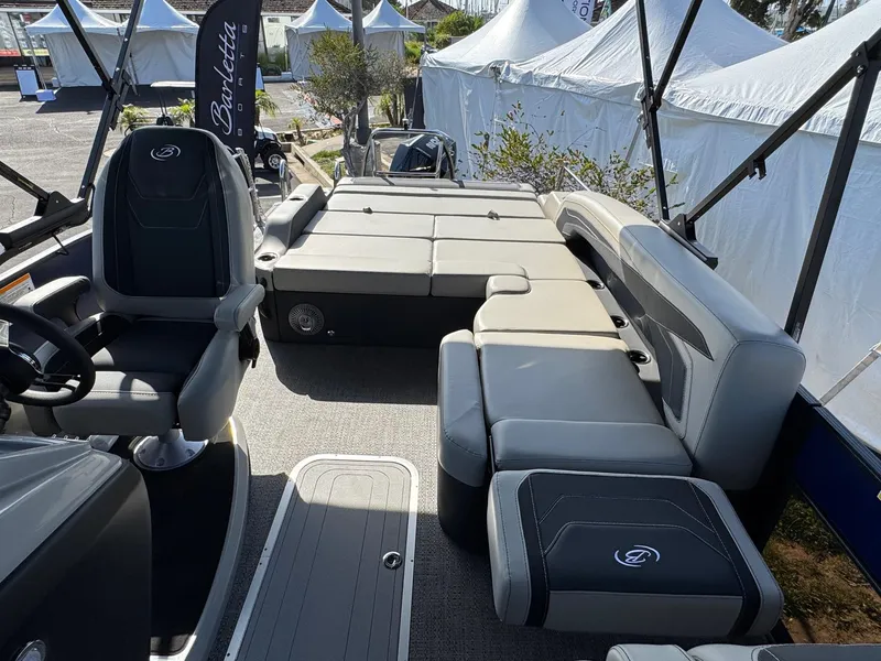 Slide: The Image of 2026 Barletta Cabrio 24U boat interior with luxurious seating and modern design. - 42