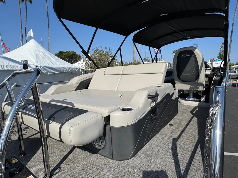 Slide: The Image of 2026 Barletta Cabrio 24U pontoon boat with spacious seating and canopy. - 44