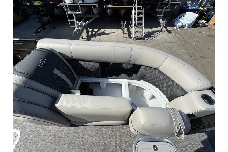 Slide: The Image of 2026 Barletta Lusso 23UC pontoon boat interior with luxurious seating and storage. - 134
