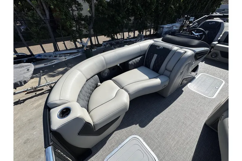 Slide: The Image of Luxurious seating on 2026 Barletta Lusso 23UC pontoon boat, featuring elegant upholstery and design. - 137