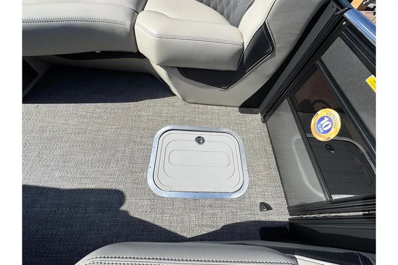 Slide: The Image of 2026 Barletta Lusso 23UC interior with gray seating and floor storage compartment. - 144