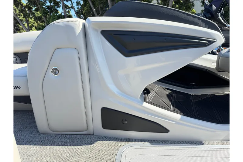 Slide: The Image of 2026 Barletta Lusso 23UC boat interior detail, featuring sleek white and black design elements. - 145