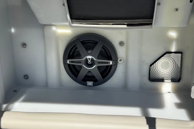 Slide: The Image of 2026 Barletta Lusso 23UC boat interior featuring JBL speaker system. - 151