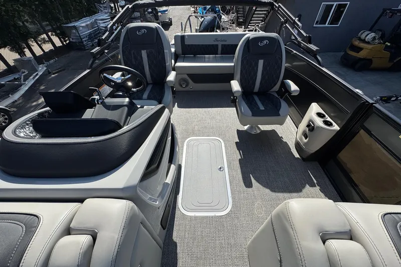 Slide: The Image of 2026 Barletta Lusso 23UC interior with luxurious seating and modern helm design. - 153