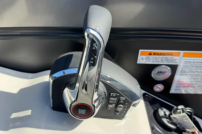 Slide: The Image of Control panel of 2026 Barletta Lusso 23UC boat with start button and warning labels. - 160