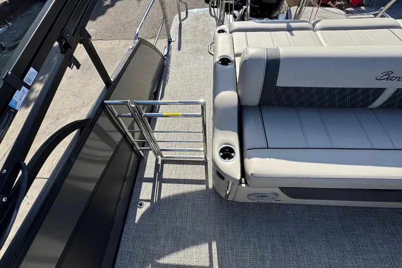 Slide: The Image of 2026 Barletta Lusso 23UC pontoon boat interior with seating and railing. - 166