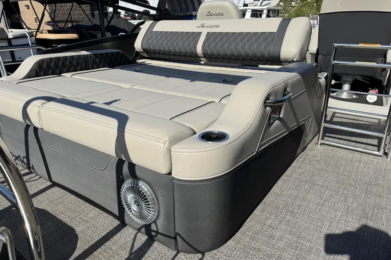 Slide: The Image of 2026 Barletta Lusso 23UC boat interior with luxurious seating and cup holders. - 167
