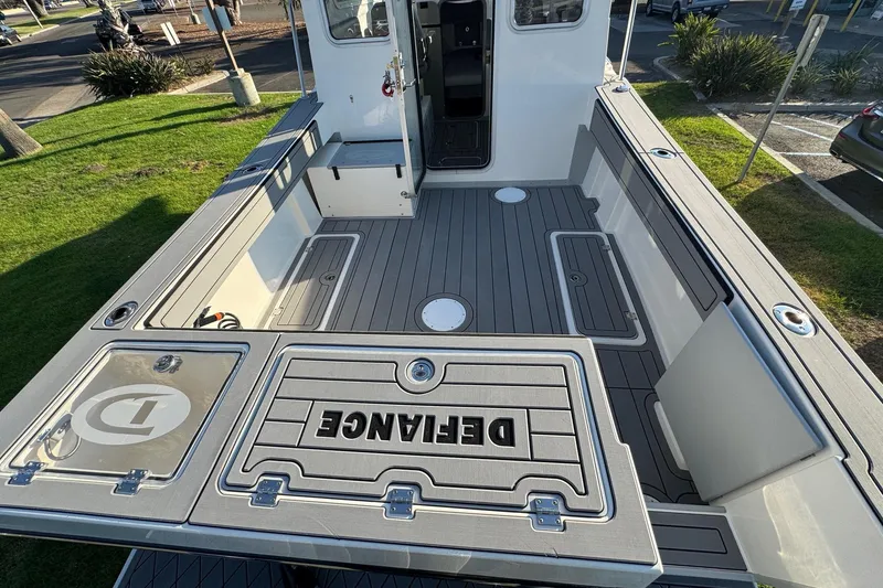Slide: The Image of 2025 Defiance Admiral 250 EX boat deck, spacious layout, modern design, and durable materials. - 37