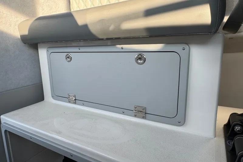 Slide: The Image of Interior storage compartment of 2025 Defiance Admiral 250 EX boat. - 59