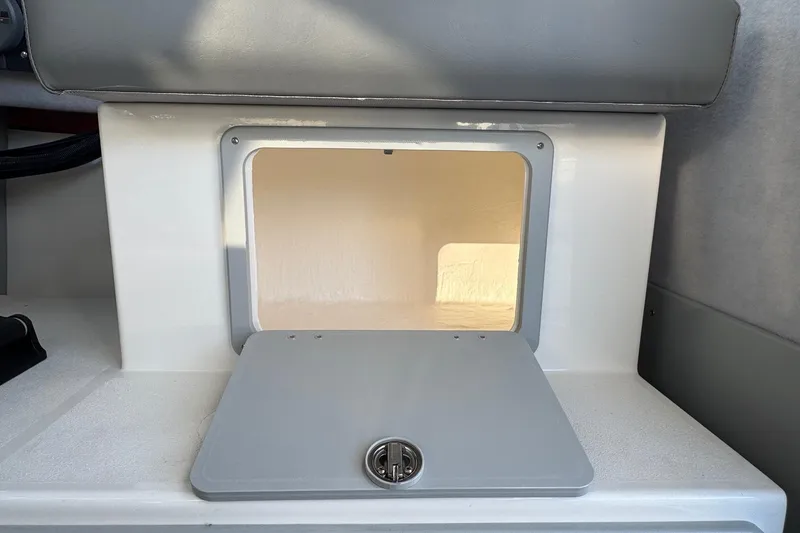 Slide: The Image of Storage compartment in 2025 Defiance Admiral 250 EX boat interior. - 66