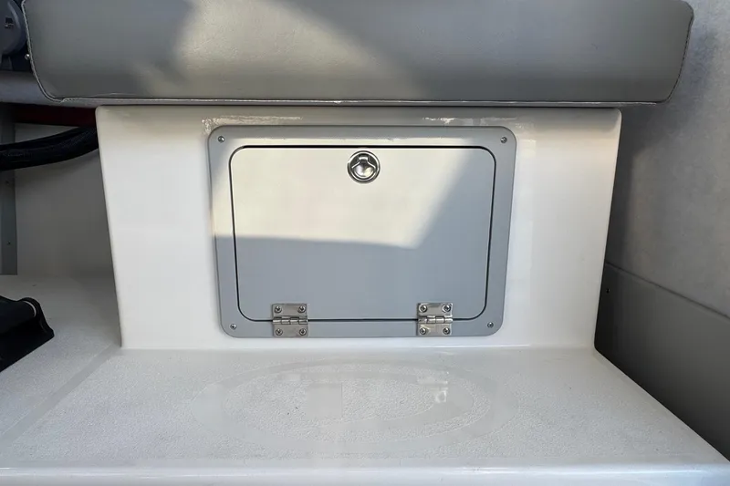Slide: The Image of Storage compartment on 2025 Defiance Admiral 250 EX boat interior. - 67
