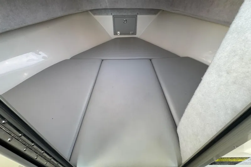 Slide: The Image of 2025 Defiance Admiral 250 EX cabin interior with cushioned seating. - 88