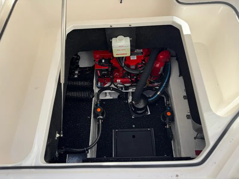 Slide: The Image of Engine compartment of 2025 Regal 26 XO boat, showcasing modern mechanical components. - 33