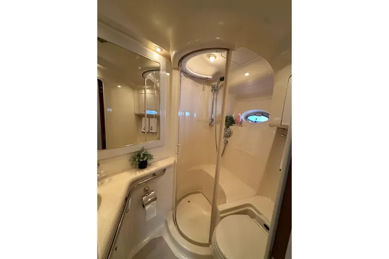 Slide: The Image of Luxurious bathroom in 2001 Sea Ray 540 Sundancer yacht with shower and vanity. - 15