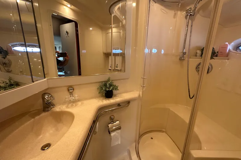 Slide: The Image of Luxurious bathroom in 2001 Sea Ray 540 Sundancer yacht with shower and vanity. - 16
