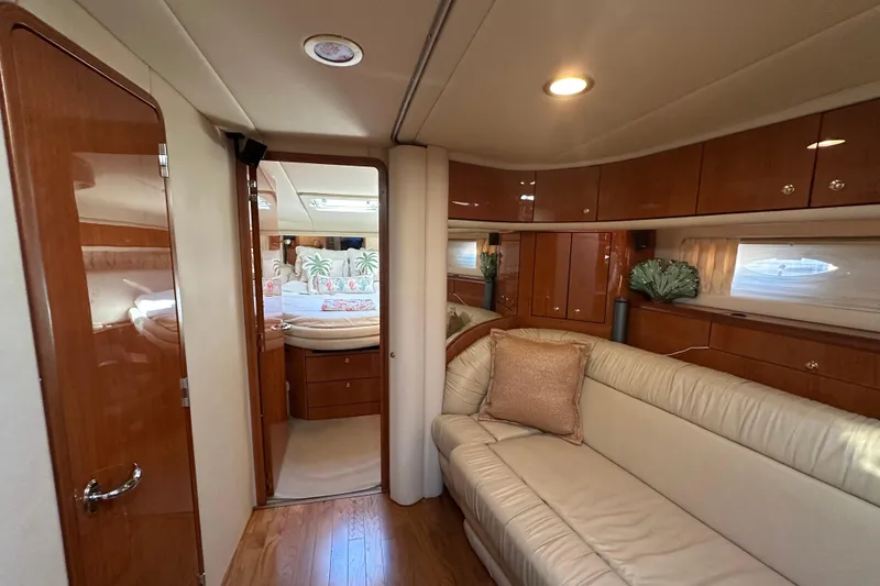 Slide: The Image of Luxurious interior of 2001 Sea Ray 540 Sundancer yacht with elegant wood finishes. - 17