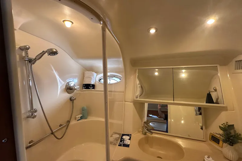 Slide: The Image of Luxurious bathroom in 2001 Sea Ray 540 Sundancer yacht with shower and vanity. - 24