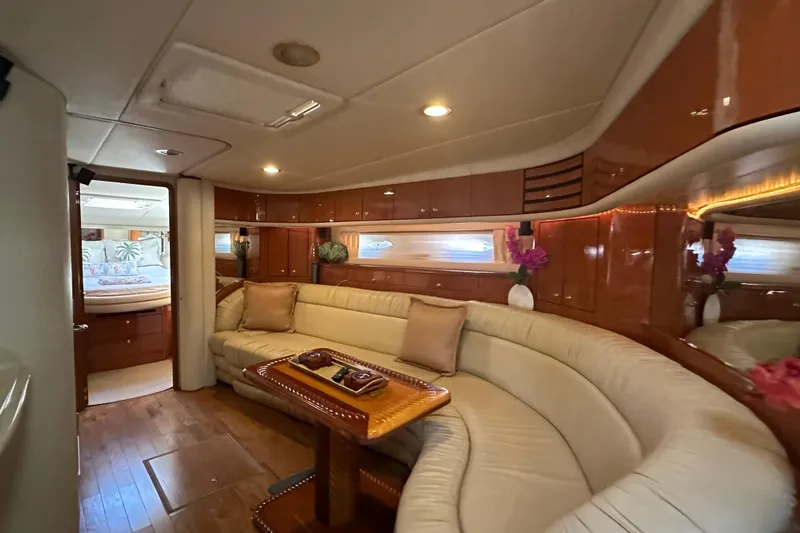 Slide: The Image of Luxurious interior of 2001 Sea Ray 540 Sundancer yacht with elegant seating and wood finishes. - 3