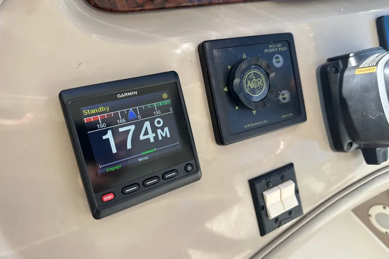 Slide: The Image of Garmin navigation display on 2001 Sea Ray 540 Sundancer yacht dashboard. - 34
